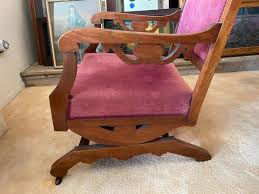 Antique Wooden Oak Hand-Carved Rocking Chair w/ Velour | EstateSales.org