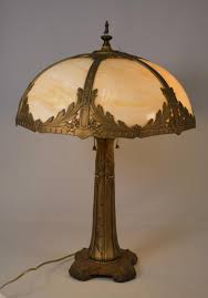 Sold at Auction: Edward Miller, EDWARD MILLER CARAMEL SLAG GLASS LAMP