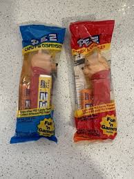 Set Of 2 PEZ Dispensers Winnie the Pooh Blue bag & Red Bag ...