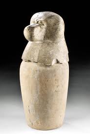 Sold at Auction: Egyptian Limestone Canopic Jar Baboon Head Hapy Lid