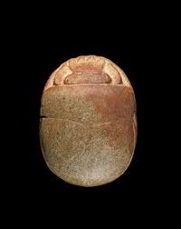 Bonhams : An Egyptian serpentine heart scarab
