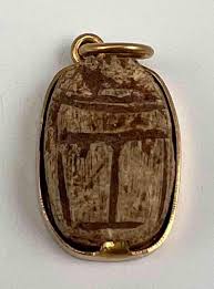 Sold at Auction: 18K Faience Scarab Pendant