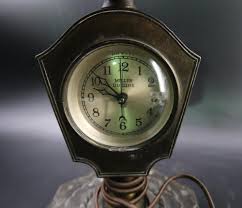 Sold at Auction: MILLER UDEZINE DESK LAMP CLOCK