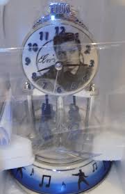 New Elvis Anniversary Clock Rotating Guitars | eBay