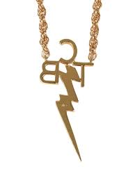 Elvis Presley 14K Gold TCB Necklace | RR Auction