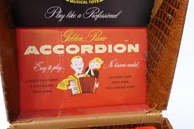 Sold at Auction: EMENEE GOLDEN PIANO ACCORDION WITH BOX RARE