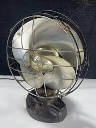 Sold at Auction: Emerson Silver Swan model, 546012 inch oscillating fan untested, 17“ x 14“ x 10“