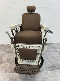 Sold at Auction: EMIL J. PAIDAR BARBER'S CHAIR