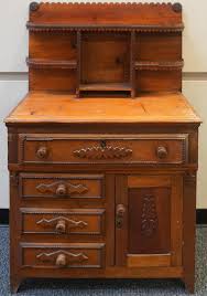 Lot - Victorian Rococo Style Stained Pine Hutch Cabinet, 49 1/2 x 31 1/2 x 18 in. (125.7 x 80 x 45.7 cm.)