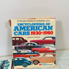 LOT 154; Buick Club License Plate Holders and Book on Classic Cars | EstateSales.org