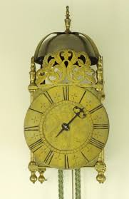 A nice English antique brass Lantern Clock with anchor ...