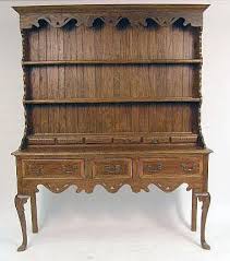 Lot - A GEORGIAN-STYLE INLAID OAK WELSH DRESSER