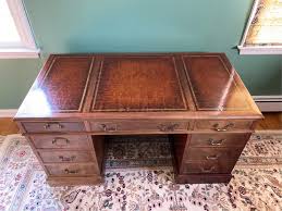 Sold at Auction: MAHOGANY LEATHER TOP DESK
