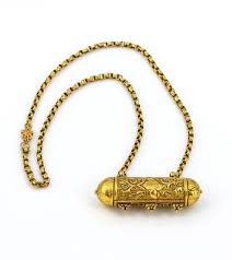 Sold at Auction: Rare Gold Capsule Necklace for Sacred Text