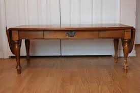 Ethan Allen Drop Leaf Coffee Table W/ Drawer | EstateSales.org