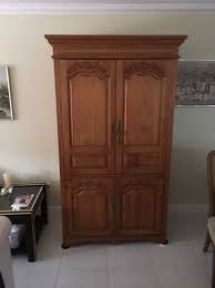Solid wood, hand carved armoire