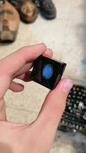 Found this opal in a shop, it has this odd green and blue flash that basically spans the entire stone. Is this something special worth getting? : r/Opals