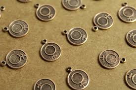 8 Pc. Antique Brass Plated Female Symbol Coin Charms: 11mm ...