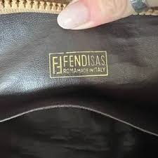 Fendi | Bags | Authentic Fendi Monogram Canvas Coated Clutch ...