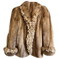 Shearling coat Dolce & Gabbana Orange size M International in Shearling - 51928931