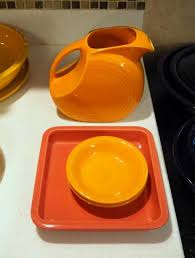 Homer Laughlin China Company Peach Fiesta Ware, Water Pitcher, Dessert Bowls, And Rose 8" Square Dish - Mayo Auction & Realty