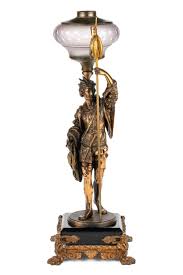 Sold at Auction: BRADLEY & HUBBARD NO. 830 FIGURAL STEM KEROSENE STAND LAMP