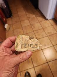 Found in a creek while fishing with text on it : r/whatisit