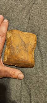 Is this rock a natural occurrence or an artifact?