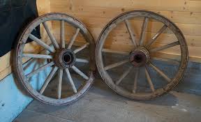 Lot - PAIR OF AMERICAN ANTIQUE WAGON WHEELS
