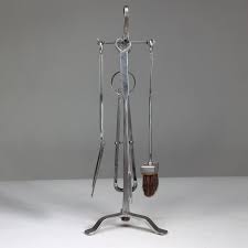 Thornton and Downer. A set of four Cotswold School hand made steel fire tools. For Sale at 1stDibs