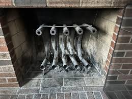 Hi all, just moved into a new house, would love help identifying what this is for, besides placing wood on. Thanks! : r/Fireplaces