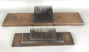 Sold at Auction: 2 Antique Wool Combs