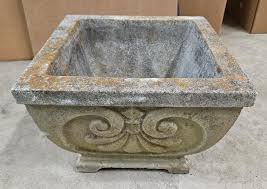Sold at Auction: 13" X 13" CONCRETE PLANTER