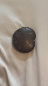 My late grandpa gave me his gemstone collection and I was wondering if this is a fossil or something like that, it feels hollow : r/fossils