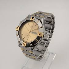 Large Bulova Silver and Gold Tone Watch, Circular Dial, Day ...