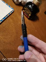 When you don't have an actual dip pen .. use the back of a ...