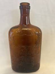 ANTIQUE T.M. REG US PAT. OFF PAT PENDING AMBER GLASS ...