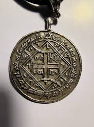 What is the meaning of the Hebrew lettering on the pendant ...