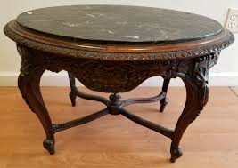 Lot - Antique Carved Wood Coffee Table w/ Black Marble T