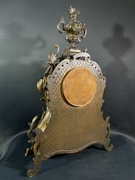 Large Louis XV style bronze cartel clock - Wall... | Antikeo