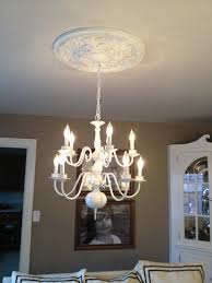 Old brass chandelier painted white