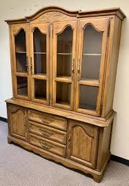 Lot - Provincial Style Oak Two Part China Cabinet, Server and Sideboard Largest: 80 x 64 x 22 in. (203.20 x 162.56 x 55.88 cm.)