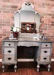 SOLD!! Vintage vanity/desk with 5 drawers, with pewter metallic finish. 70" tall, 46" wide, depth 19". Chair is included. $295