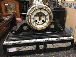 Lot 1885 - Antique slate mantel clock with a figure of