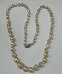 An 18″ Strand Of Baroque Freshwater Pearls – Exeter Jewelers