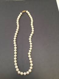 16 in Cultured 7mm Pearl Necklace w/ 14kt gold clasp