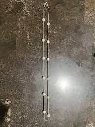 Maker mark on antique sterling silver necklace help needed