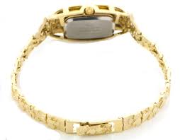 14k Gold 16mm Tappering to 5mm Ladies Nugget Watch| Sarraf.com