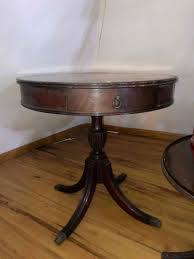 Sold at Auction: Antique Drum table with drawer