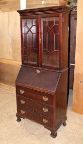 Sold at Auction: Jasper mahogany secretary desk with bookcase top